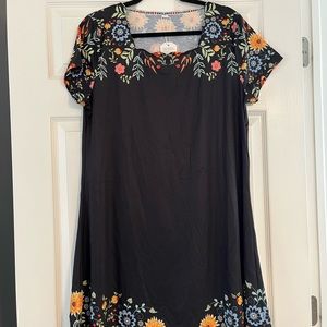 NWT Beach cover up. Black with floral pattern